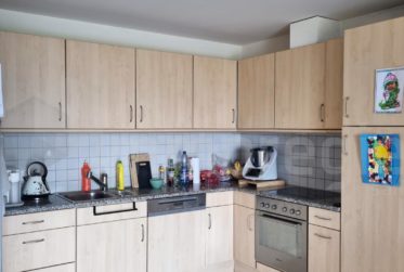 Magnifique appartement de 2,5 pièces en rez-de-jardin avec vue imprenable sur le lac et les montagnes